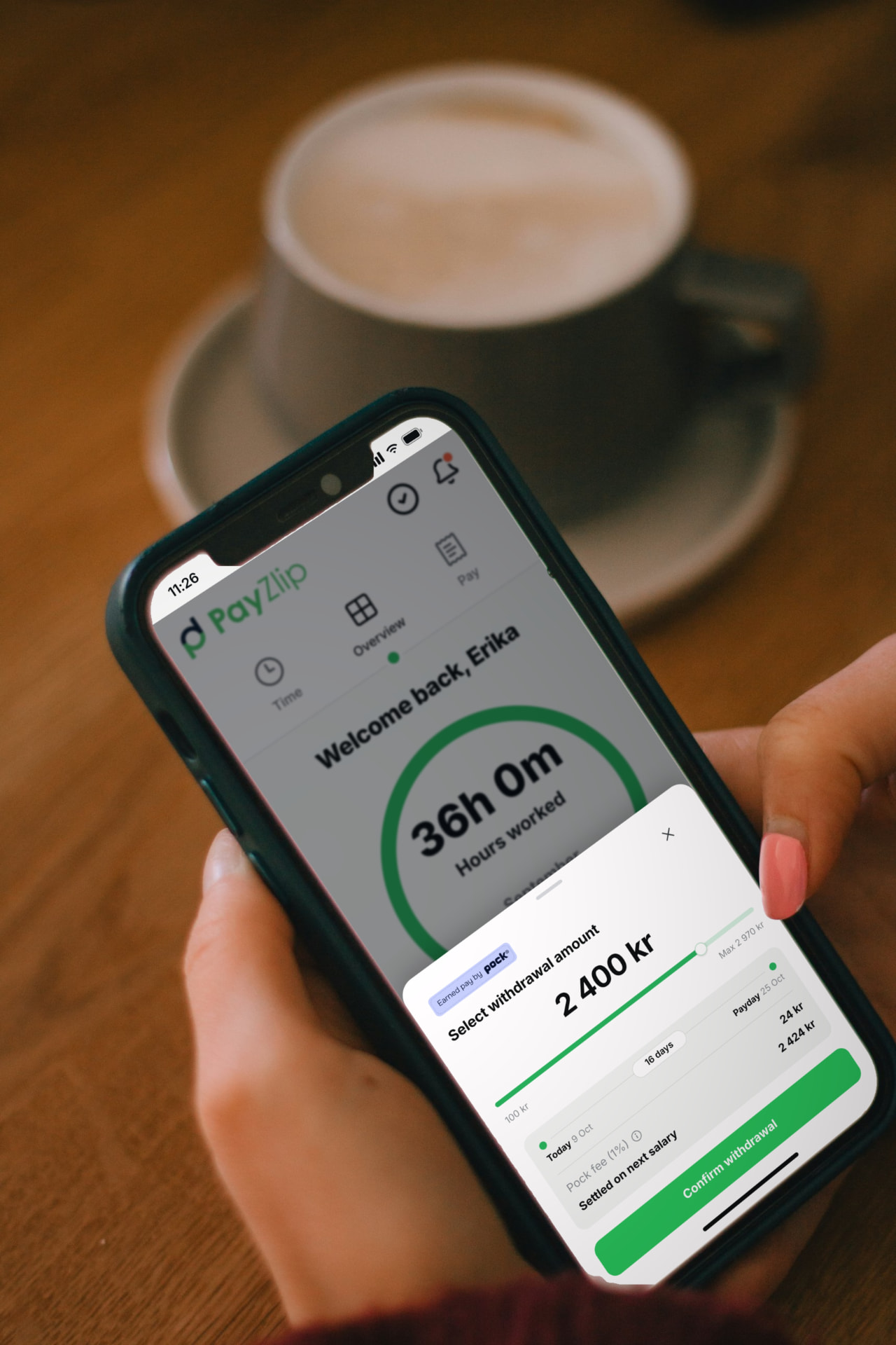 A person confirming an earned pay withdrawal inside their workforce app
